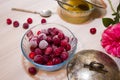 Frozen cherry in a glass vase