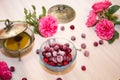 Frozen cherry in a glass vase