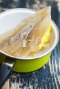 Frozen chicken stock in a kettle Royalty Free Stock Photo