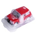 frozen children's toy car on a white isolated background Royalty Free Stock Photo
