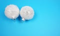 Frozen christmas snow balls at blue background with copy space for your own text Royalty Free Stock Photo