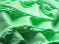 Frozen creamy Mint flavour gelato - full frame detail. Close up of a green surface texture of Ice cream