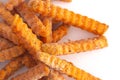 Frozen Crinkled Sweet Potato Fries on a White Background