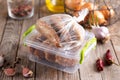 Frozen cutlets in a container and bag. Ready frozen food Royalty Free Stock Photo