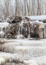 Frozen Dauda waterfall in winter. Dripping icicles Royalty Free Stock Photo