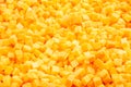 Frozen diced pumpkin. Food background. Top view