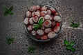 Frozen dogwood berries with mint leaves Royalty Free Stock Photo