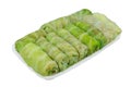 Frozen doves in a white container. Isolated on a white background. Stuffed cabbage rolls are frozen. Home cooking. Royalty Free Stock Photo