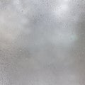 Frozen drops on frosted glass. Winter textured background. Royalty Free Stock Photo