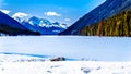 Frozen Duffey Lake and the snow capped peaks of Mount Rohr in BC Canada Royalty Free Stock Photo