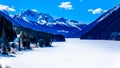 Frozen Duffey Lake and the snow capped peaks of Mount Rohr in BC Canada Royalty Free Stock Photo