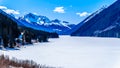 Frozen Duffey Lake and the snow capped peaks of Mount Rohr in BC Canada Royalty Free Stock Photo