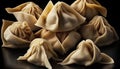 Frozen dumplings on a black background, close-up