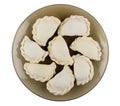 Frozen dumplings in brown plate isolated on white background Royalty Free Stock Photo