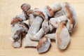 Frozen edible mushrooms lie on a cutting Board