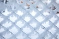 Frozen fence made of metal mesh Royalty Free Stock Photo