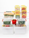 Frozen food in the refrigerator. Vegetables on the freezer shelves. Royalty Free Stock Photo