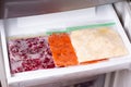 Frozen food in the refrigerator. Vegetables on the freezer shelves Royalty Free Stock Photo