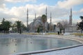 Frozen Fountain and the Blue Mosque a frosty january day. Istanbul, Turkey Royalty Free Stock Photo