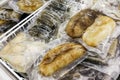 Frozen fresh abalone and sea cucumber, packaged for retail