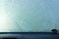 A frozen  front windshield of a car from inside view Royalty Free Stock Photo