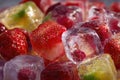 Frozen fruits in ice cubes Royalty Free Stock Photo