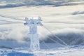 frozen funicular support poles. ski lift technology, ski resort, mountain resort. Royalty Free Stock Photo