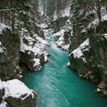 Frozen Gorge Framing Vibrant Blue River Royalty Free Stock Photo
