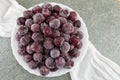 Frozen grapes in a white bowl Royalty Free Stock Photo