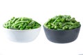 frozen green beans in a black and white ceramic plate isolated on white background Royalty Free Stock Photo