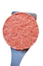 Frozen Hamburger Patty on a Spatula Royalty Free Stock Photo