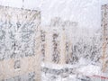 Frozen home window and view of apartment houses