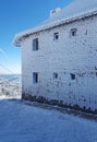 Frozen house in winter