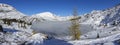 Frozen Ice Covered Mountain Lake Isolated Larch Tree Wide Panoramic Landscape Banff national Park Canadian Rockies Alberta