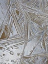 frozen ice on a puddle in winter Royalty Free Stock Photo