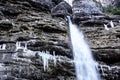 Frozen ice waterfall, winter landscape. Ephemeral, cold and winter concept. Valganna waterfall, northern Italy