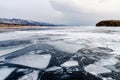 Frozen Lake Baikal. Beautiful stratus clouds over the ice surface on a frosty day. Natural background Royalty Free Stock Photo