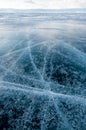 Frozen Lake Baikal. Beautiful stratus clouds over the ice surface on a frosty day. Natural background Royalty Free Stock Photo