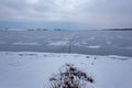 Frozen Lake. Beautiful stratus clouds over the ice surface on a frosty day. Natural background Royalty Free Stock Photo