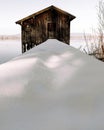 Frozen lake boathouse