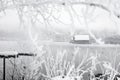 Frozen lake boathouse