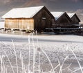 Frozen lake boathouse