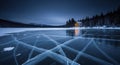 Frozen lake with cracks at night Royalty Free Stock Photo