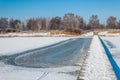 Frozen lake in a Dutch nature area Royalty Free Stock Photo