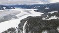 Frozen lake and forests Royalty Free Stock Photo