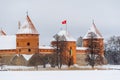 Facade of the historical Trakai stone castle in winter, front view, Lithuania. Royalty Free Stock Photo