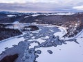 Frozen lake with mountains and forests covered with snow in Transylvania Romania Royalty Free Stock Photo