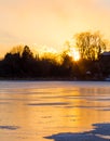 Frozen Lake at Sunset