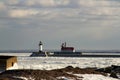 Frozen Lake Superior rocky shoreline with The Crib, lighthouses Royalty Free Stock Photo