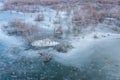 Frozen lake at wintertime at an abandoned water dam Royalty Free Stock Photo